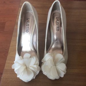 White peep toe heels with a fabric flower